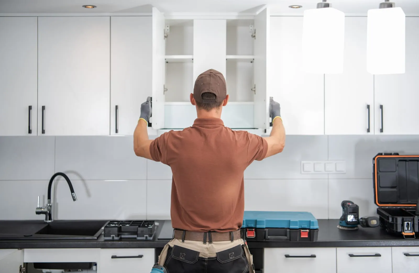 Cabinet installation in progress during a kitchen remodel
