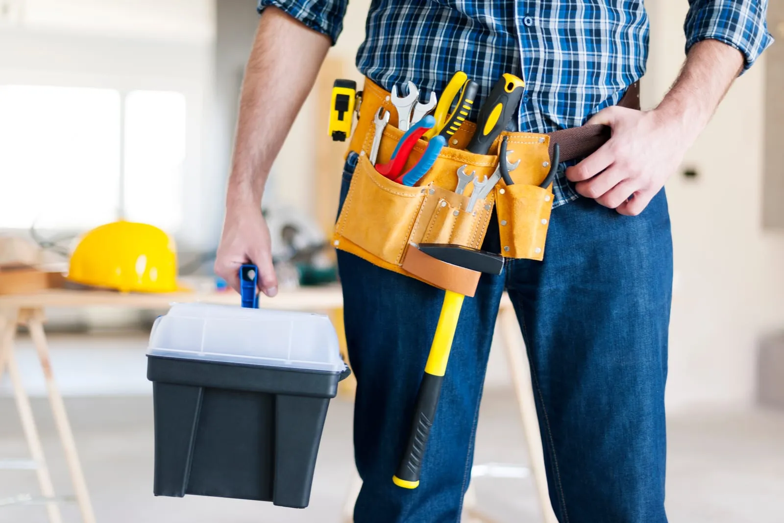 Professional handyman with tools ready for repairs